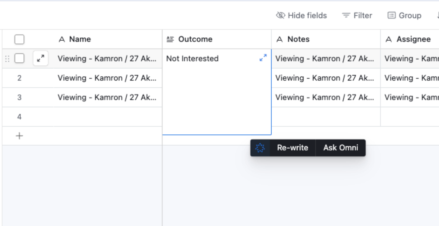 A single Outcome cell being edited by hand in Airtable, with its field-level AI assist open